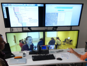 CSIRO staff showcase how the CCP allows real-time group-to-group interaction across the containment barrier while also allowing a collaborative workspace and live interaction with laboratory devices and information systems.