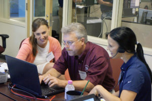 Maryn Ptaschinski, DVM, JBS Live Pork senior staff veterinarian; Harry Snelson, American Association of Swine Veterinarians director of communications; and Sarah Caffey, MPH, IIAD training specialist; represent aspects of the swine industry as they work through the third vignette of the AgConnect® Emergency Exercise.
